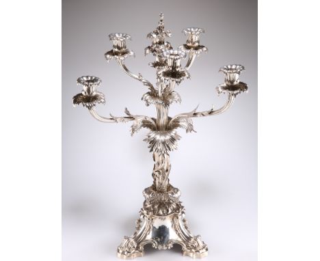 A VICTORIAN SILVER SIX-LIGHT CANDELABRUM CENTREPIECE, by Edward, John & William Barnard, London 1847, of naturalistic foliate