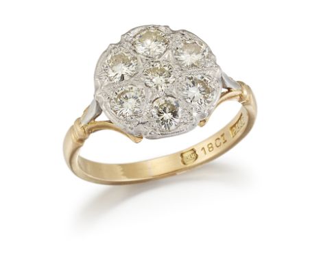 A DIAMOND CLUSTER RING, milgrain set with seven round brilliant-cut diamonds, to forked shoulders, total estimated diamond we