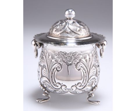 A VICTORIAN SILVER CADDY,&nbsp;by Walker &amp; Hall, Birmingham 1899, of cauldron form with shaped rim and twin ring handles,