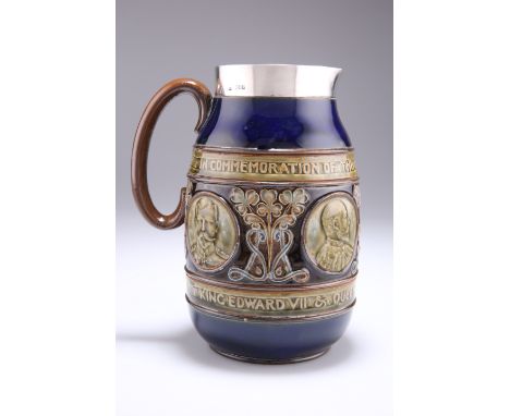 A SILVER-MOUNTED ROYAL DOULTON STONEWARE PITCHER, London 1902,&nbsp;with Royal blue borders and portrait medallions of King E