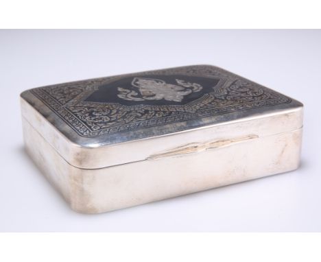 AN EARLY 20TH CENTURY THAI SILVER CIGARETTE BOX, rounded rectangular, decorated with the figure of a seated&nbsp;bodhisattva,