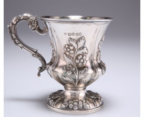 A VICTORIAN SILVER MUG,&nbsp;maker's mark unclear (possibly Edward Edwards II), London 1838, baluster shape, the body as four