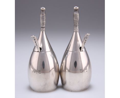 A PAIR OF GEORGE V SILVER NOVELTY MUSTARD POTS,&nbsp;by Goldsmiths &amp; Silversmiths Co Ltd,&nbsp;London 1926, in the form o