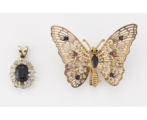 A 9CT GOLD SAPPHIRE AND RUBY BUTTERFLY BROOCH, hallmarked London 1986, measures 3.7cm by 2.5cm; AND A 9CT GOLD SAPPHIRE AND D