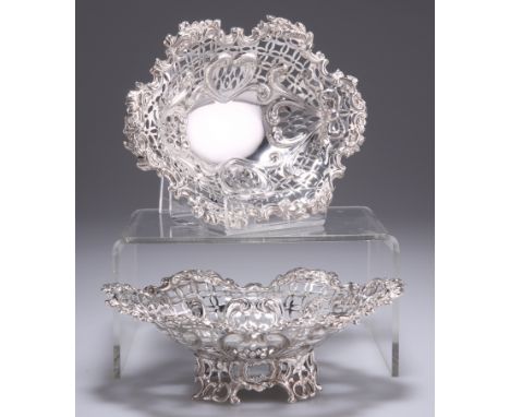 A PAIR OF VICTORIAN SILVER PIERCED BOWLS,&nbsp;by John Millward Banks, London 1893, shaped oval, each with C-scroll and folia