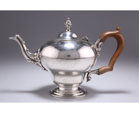 A WILLIAM IV SILVER TEAPOT,&nbsp;by&nbsp;Charles Fox II, London 1830, pear-shaped, the spout leaf- and shell-capped, raised o