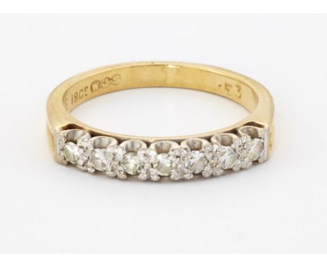A DIAMOND HALF HOOP RING, seven eight-cut diamonds to fluted shoulders, total estimated diamond weight 0.20 carat approximate