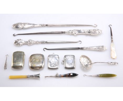 A GROUP OF SILVER AND PLATE, including two silver vesta cases, silver sifting spoon, four large button hooks with silver hand