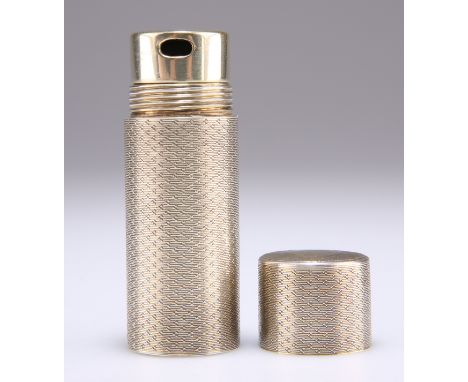 A GEORGE V SILVER-GILT PILL BOX,&nbsp;by&nbsp;Asprey &amp; Co Ltd, London 1914, cylindrical with engine-turned ground. 7cm hi
