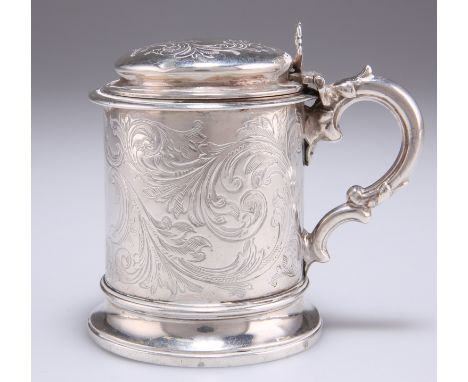 A VICTORIAN SILVER MUSTARD POT,&nbsp;by&nbsp;George Frederick Pinnell, London 1850, cylindrical with domed hinged cover and d