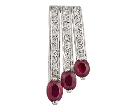 A RUBY AND DIAMOND PENDANT, three graduated diamond set ribbons terminating in oval-cut rubies, total estimated diamond weigh