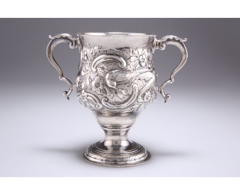 A GEORGE III IRISH SILVER TWO-HANDLED CUP,&nbsp;by Matthew Walsh, Dublin, c.1770, vase shaped, the scroll handles with leaf-f