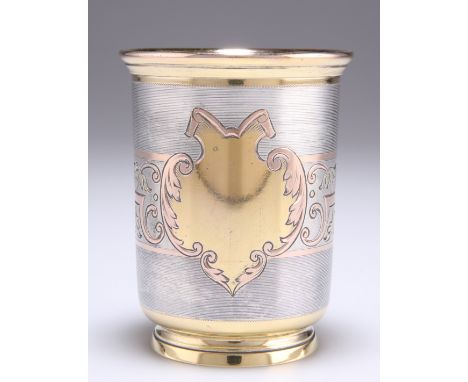 A 19TH CENTURY GERMAN SILVER-GILT BEAKER CUP, by Koch &amp; Bergfeld, the straight-sided tumbler with engine-turned reeding a