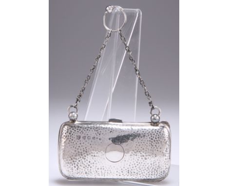 AN EDWARDIAN SILVER PURSE,&nbsp;by Boots Pure Drug Company, Birmingham 1907, rounded rectangular, spot hammered all-over, vac