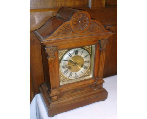 Early 20th Century carved walnut mantle clock, 16 1/2" high