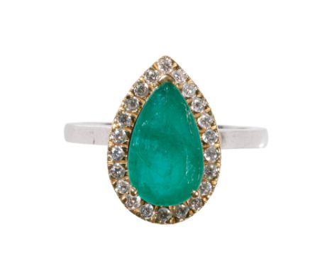 EMERALD AND DIAMOND CLUSTER RING, the pear-cut emerald, approx 11.8mm x7mm, surrounded by a border of brilliant-cut diamonds,