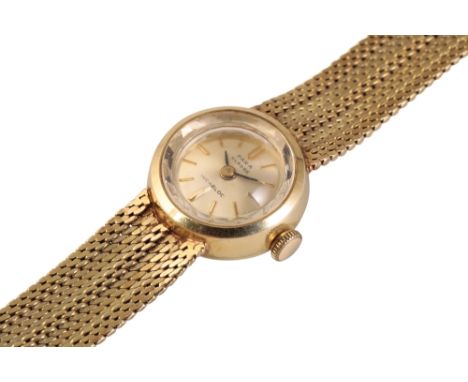 A PARA 14ct GOLD LADYS BRACELET WATCH with manual wind movement, silver dial, gold baton numerals and hands, circa 1960's, ca