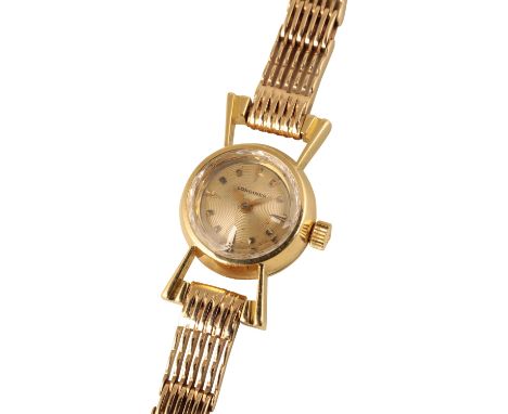 LONGINES 9CT GOLD LADY'S BRACELET WATCH, circa 1960's, with manual wind movement, the gold dial with gold baton numerals and 