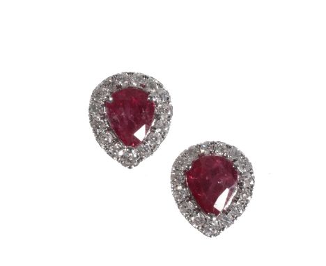 RUBY AND DIAMOND CLUSTER EAR STUDS, of heart form, the butterfly fasteners stamped "750"