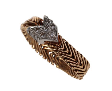 TIFFANY VINTAGE RING DESIGNED BY PALOMA PICASSO CIRCA 1980, the 18k yellow gold articulated band, set with a pave-set diamond