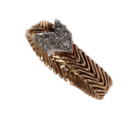 TIFFANY VINTAGE RING DESIGNED BY PALOMA PICASSO CIRCA 1980, the 18k yellow gold articulated band, set with a pave-set diamond