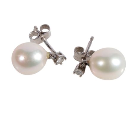 PAIR OF CULTURED PEARL AND DIAMOND EAR STUDS, the white tone pearl suspended from a single round-cut diamond, approx .05ct, c