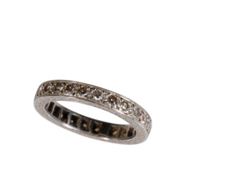 DIAMOND FULL ETERNITY RING, on unmarked white metal, ring size M