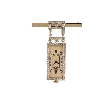 CARTIER LADY'S 18CT WHITE AND YELLOW GOLD DIAMOND LAPEL WATCH, circa 1908, with manual wind movement, the white dial with bla