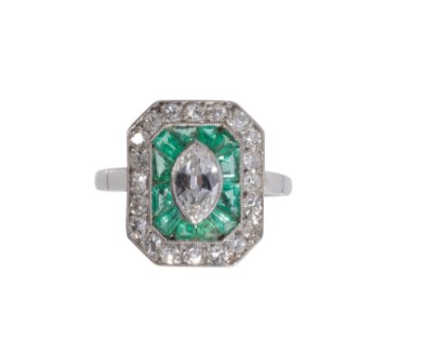 ART DECO EMERALD AND DIAMOND RING, the marquise-cut diamond, approx .50ct, surrounded by a border of various cut emeralds and