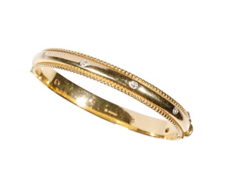 THEO FENNEL HAND MADE GOLD DIAMOND SET HINGED BANGLE, eight brilliant-cut diamonds, set to the centre of the bangle, with bea