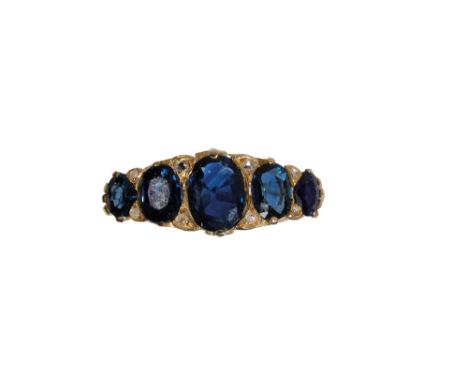 FIVE STONE SAPPHIRE RING, five oval-cut sapphires, approx 2.40ct total weight, interspersed with diamonds,on an 18ct yellow g