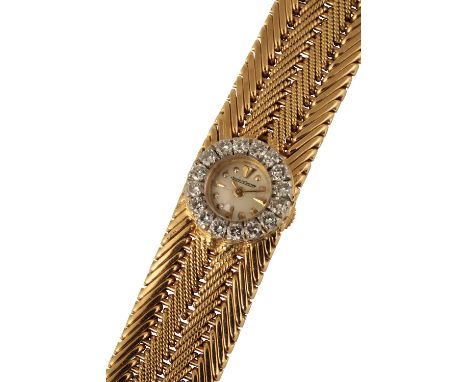 JAEGER LE-COULTRE 18CT GOLD LADY'S BRACELET WATCH, circa 1950's, with manual wind movement, the silver dial with gold baton n