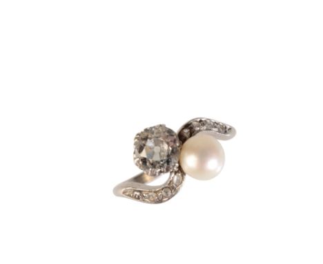 EDWARDIAN DIAMOND AND CULTURED PEARL CROSSOVER RING, the old-cut diamond approx 0.75 carats, single white tone cultured pearl