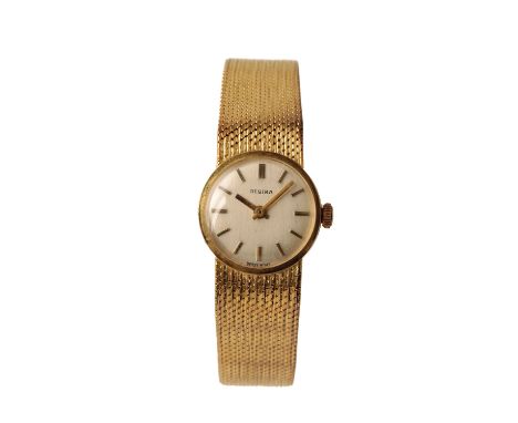 DESIRA 14CT GOLD LADY'S BRACELET WATCH, circa 1960's, with manual wind movement, the silver dial with gold baton numerals and