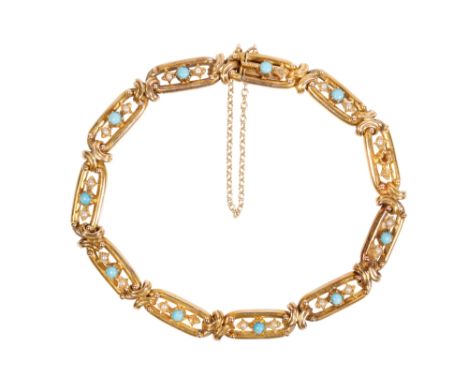 GOLD TURQUOISE AND SEED PEARL BRACELET, eleven links set with turquoise and seed pearls, the concealed clasp stamped "15", wi