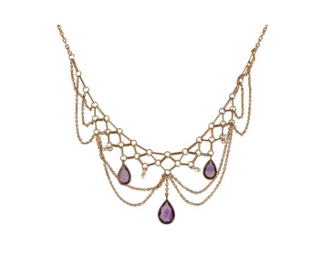 AMETHYST AND SEED PEARL NEGLIGEE NECKLACE, attached to a fine link yellow gold chain stamped "585", 42cm long