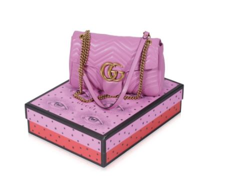 GUCCI SHOCKING PINK STITCHED LEATHER SHOULDER BAG, the flap over front with a "GG"clasp, gilt chain and leather strap, the in