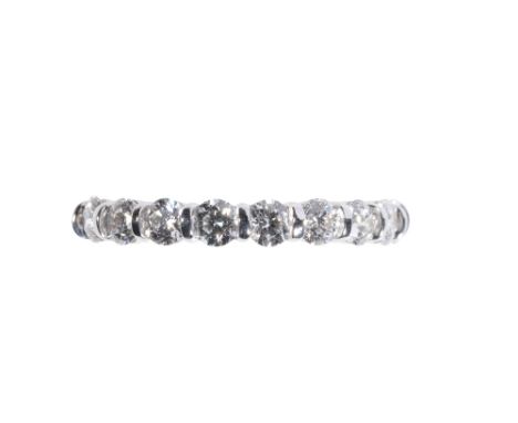 DIAMOND HALF ETERNITY RING, nine round-cut diamonds, approx 0.63ct total weight, on a white gold shank, stamped "750", ring s