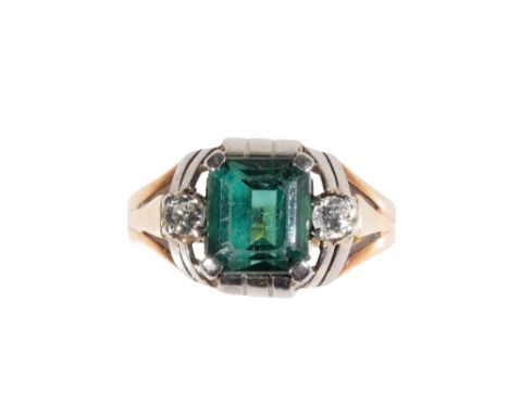 TOURMALINE AND DIAMOND RING, the tourmaline claw set in unmarked white metal, flanked either side with a single brilliant-cut