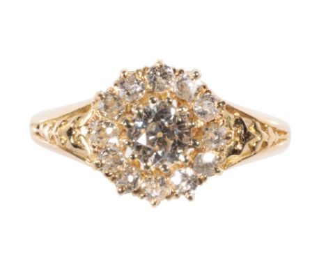 DIAMOND CLUSTER RING, the centre old-cut diamond approx .40 ct, surrounded by a border of twelve further diamonds, on an 18ct