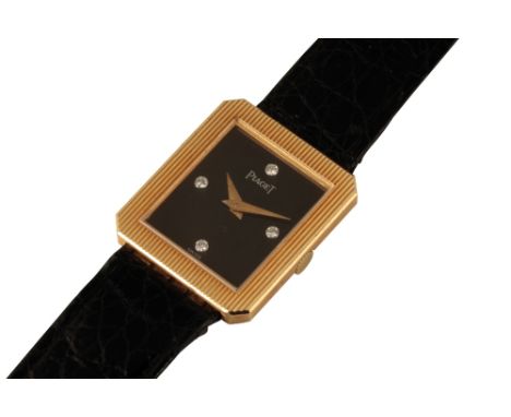 PIAGET 18 CT GOLD LADY'S WRISTWATCH with manual wind movement, black dial, diamond numerals, gold hands, on original Piaget b