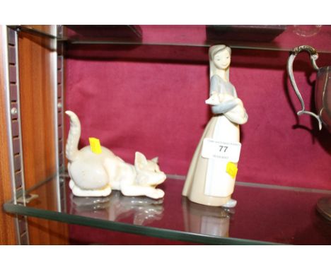 A Lladro cat and a Lladro figurine
