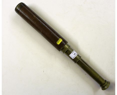 A brass and leather telescope by Broadhurst, Clarkson and Co. Ltd of London