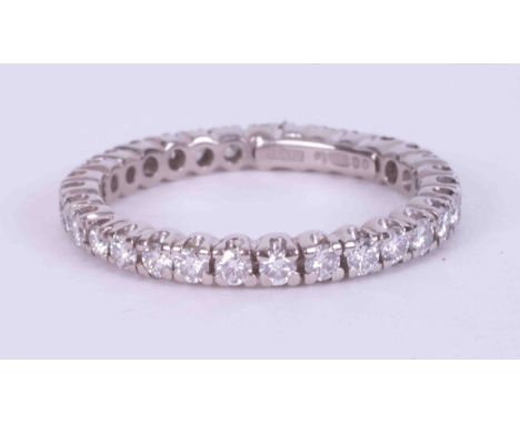 An 18ct white gold full eternity set with approx. 0.93 carats of round brilliant cut diamonds, colour G-H &amp; SI clarity, w