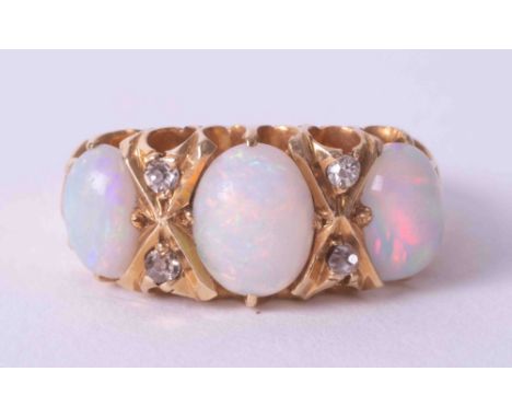 A 18ct yellow gold opal and diamond ring, size K.