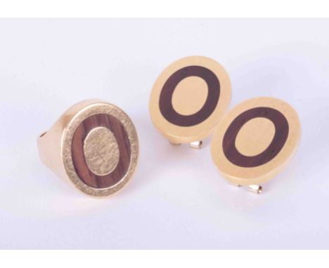 A modern set comprising a ring and earrings, gold (testing as 14ct gold but markings not identifiable) with oval wood inserts