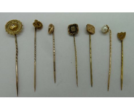 Seven stick pins, including two marked 15ct, total weight 10.3g