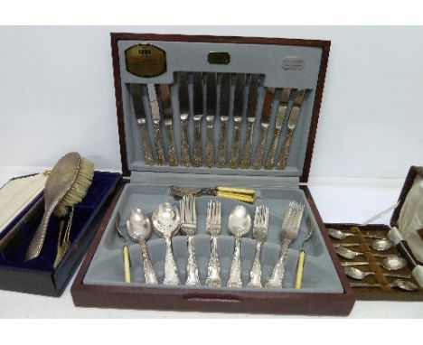 A part Viners canteen of cutlery, a silver backed brush and comb, a/f, and other cutlery