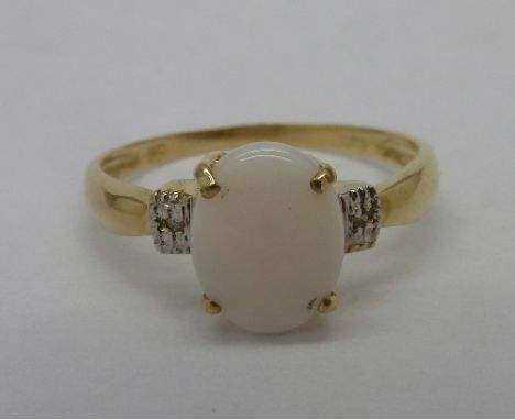 A 9ct gold and opal ring, weight 1.2g, size O