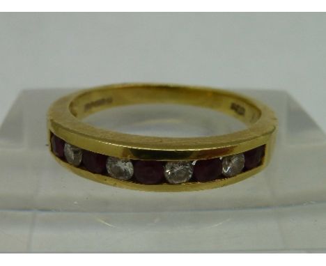 An 18ct gold, ruby and diamond ring, weight 3.8g, size K